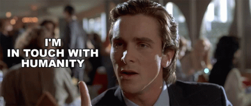 A Man Giving A Thumbs Up With The Words " I 'M In Touch With Humanity " Above Him GIF