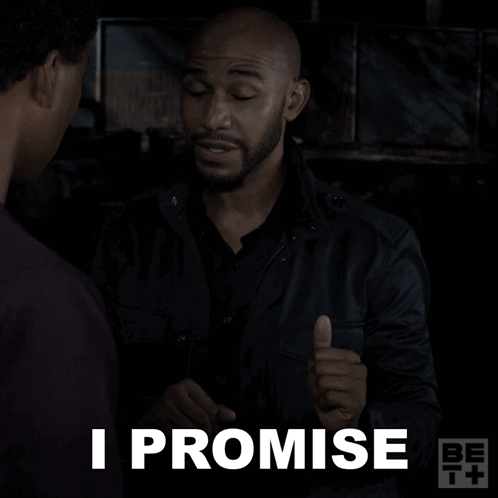 A Man Giving A Thumbs Up With The Words I Promise Behind Him GIF