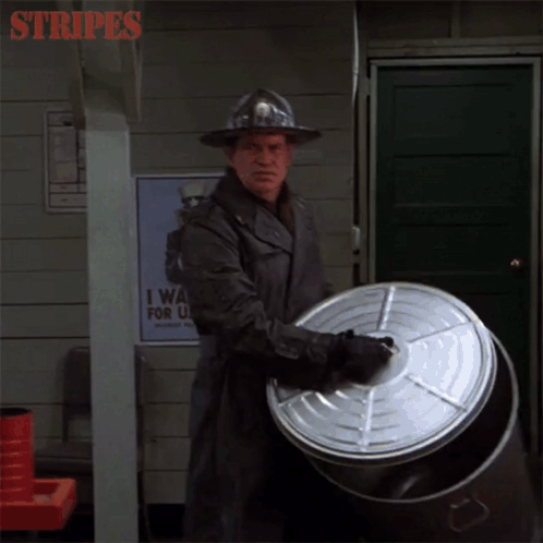 A Man Holding A Barrel With The Words Rise And Shine Thank Me Later On The Bottom GIF