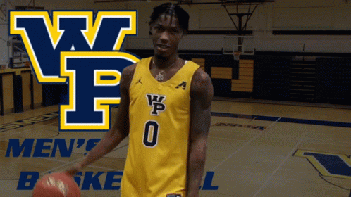 A Man Holding A Basketball In Front Of A Wpf Logo GIF