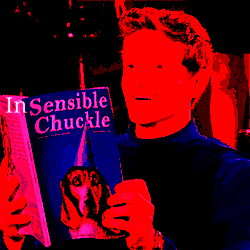 A Man Holding A Book Titled Insensible Chuckle GIF