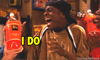 A Man Holding A Bottle Of Orange Soda With The Word I Do On It GIF