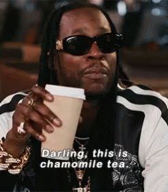 A Man Holding A Cup Of Chamomile Tea GIF