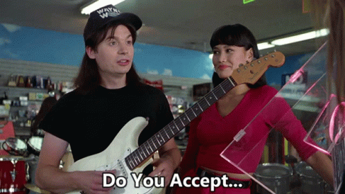 A Man Holding A Guitar Next To A Woman With The Words Do You Accept GIF