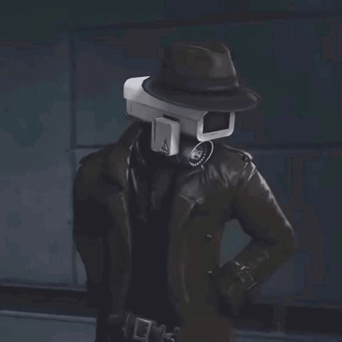 A Man Holding A Gun With A Camera Attached To His Head GIF
