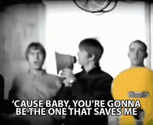 a man holding a megaphone with the words " cause baby you 're gonna be the one that saves me " above him