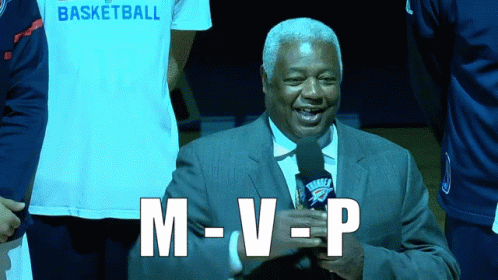 A Man Holding A Microphone With The Word M-V-P Written On It GIF