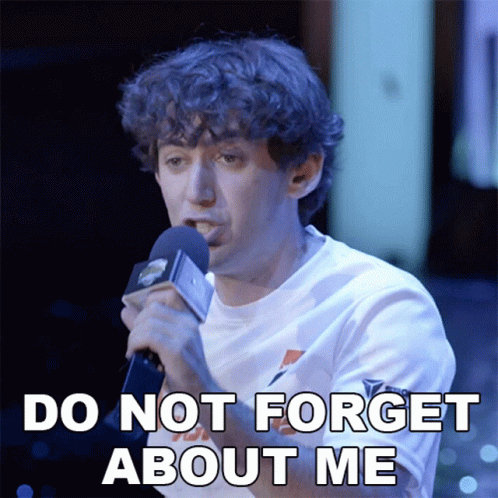 A Man Holding A Microphone With The Words Do Not Forget About Me Below Him GIF