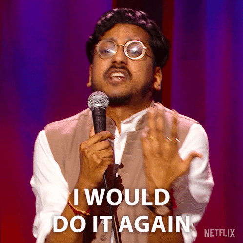A Man Holding A Microphone With The Words I Would Do It Again On The Bottom GIF