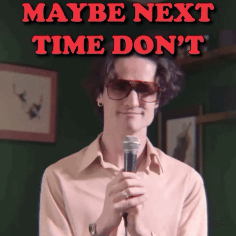 A Man Holding A Microphone With The Words Maybe Next Time Do N't Behind Him GIF