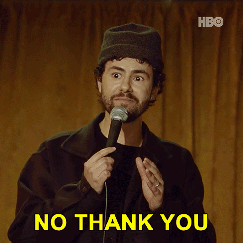 A Man Holding A Microphone With The Words No Thank You Behind Him GIF