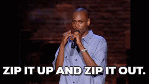 A Man Holding A Microphone With The Words Zip It Up And Zip It Out GIF