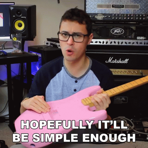 A Man Holding A Pink Guitar In Front Of A Marshall Amp GIF