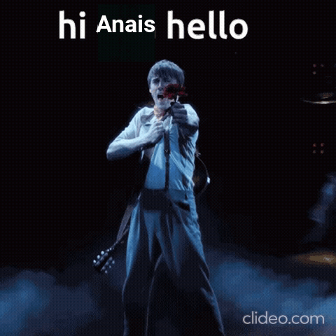 A Man Holding A Red Rose With The Words Hi Anais Hello Written Above Him GIF