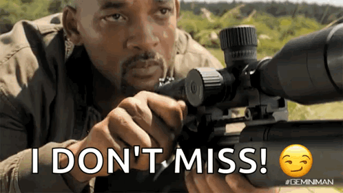 A Man Holding A Sniper Rifle With The Words " I Don 'T Miss " On The Bottom GIF