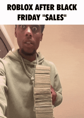 A Man Holding A Stack Of Money With The Words Roblox After Black Friday Sales GIF