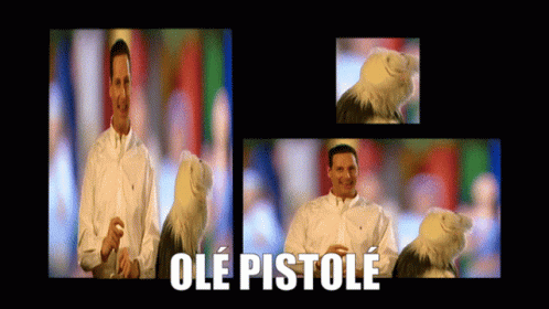 a man holding a stuffed eagle with ole pistole written in white