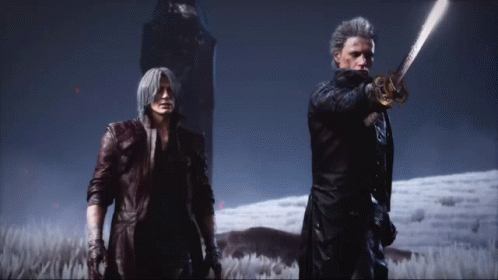 A Man Holding A Sword Stands Next To Another Man In A Field GIF