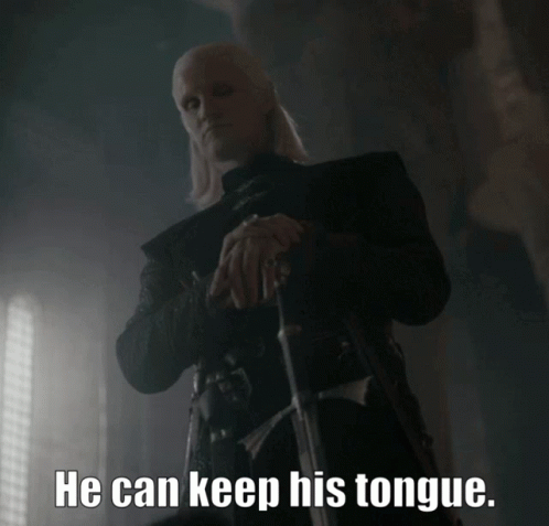 a man holding a sword with the words he can keep his tongue below him