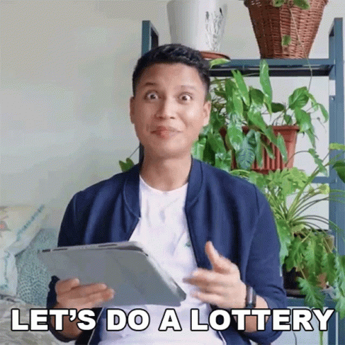 A Man Holding A Tablet With The Words Let 'S Do A Lottery Below Him GIF