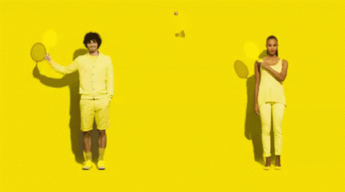 A Man Holding A Tennis Racquet And A Woman Holding A Tennis Racket On A Yellow Background GIF