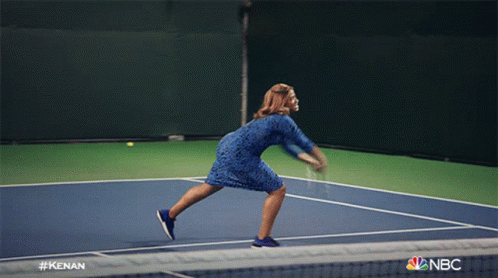 A Man Holding A Tennis Racquet On A Tennis Court With The Nbc Logo GIF