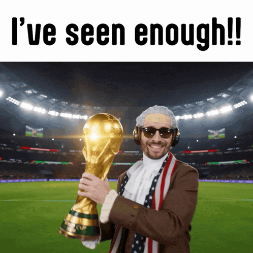 A Man Holding A Trophy That Says ' I 'Ve Seen Enough ' On The Top GIF