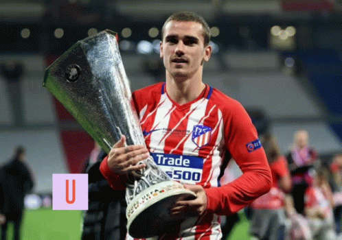 A Man Holding A Trophy That Says Trade 500 GIF