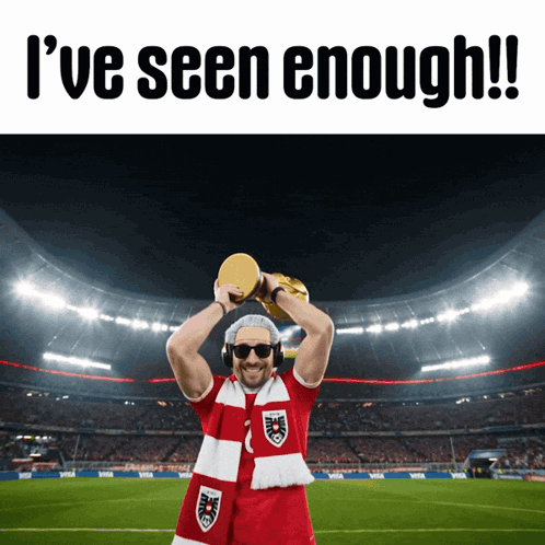 A Man Holding A Trophy With The Words " I 'Ve Seen Enough " On The Bottom GIF