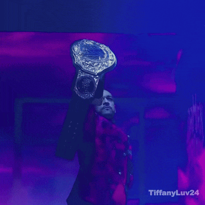 A Man Holding A Trophy With Tiffanyluv24 Written In The Corner GIF
