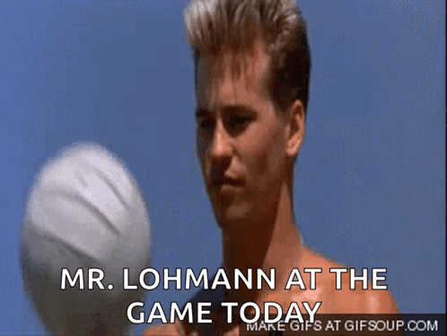 A Man Holding A Volleyball With The Words Mr. Lohmann At The Game Today Above Him GIF