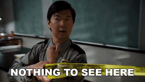 A Man Holding A Yellow Tape That Says Nothing To See Here On It GIF
