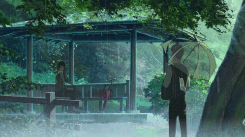 A Man Holding An Umbrella Stands Next To A Woman Sitting On A Bench In The Rain GIF