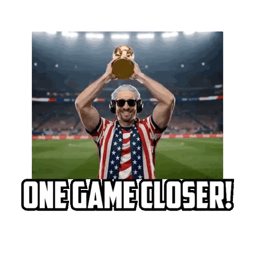 a man holding up a trophy with the words one game closer