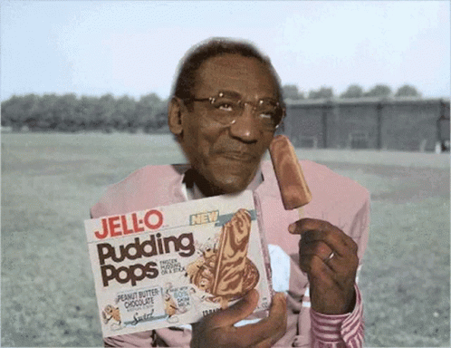 A Man Holds A Box Of Jello Pudding Pops GIF