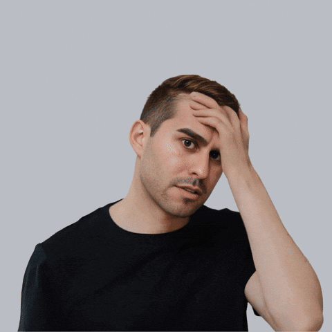 A Man Holds His Hand To His Forehead With The Words When Someone Says Blockchain Is A Scam Above Him GIF