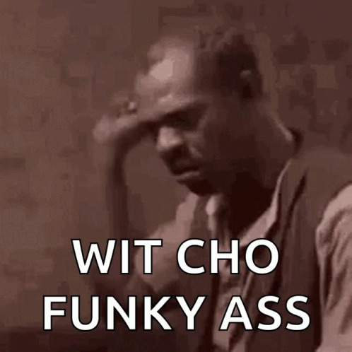 A Man Holds His Hand To His Forehead With The Words Wit Cho Funky Ass Written Below Him GIF