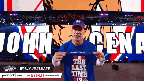 A Man Holds Up A Shirt That Says The Last Time Is GIF
