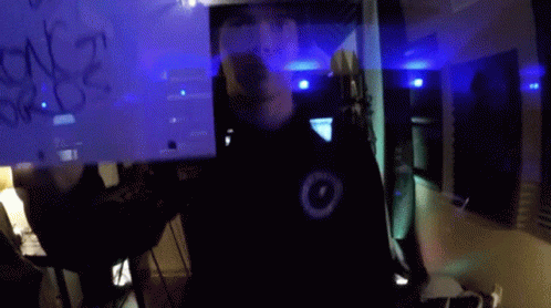 A Man Holds Up A Sign That Says I 'M A Glass Cage Of Emotion GIF