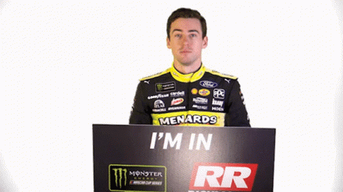 A Man Holds Up A Sign That Says I 'M In Richmond Raceway GIF