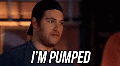 A Man In A Baseball Cap Is Saying `` I 'M Pumped '' While Standing Next To Another Man . GIF