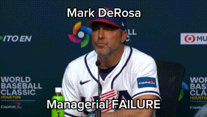 a man in a baseball uniform is sitting in front of a microphone with the words mark derosa managerial failure below him