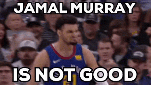 A Man In A Basketball Uniform Is Standing In Front Of A Crowd . GIF