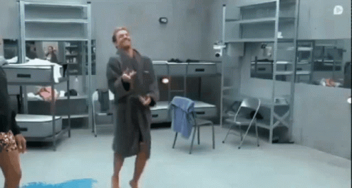 Man In Bathrobe Dancing In Room GIF