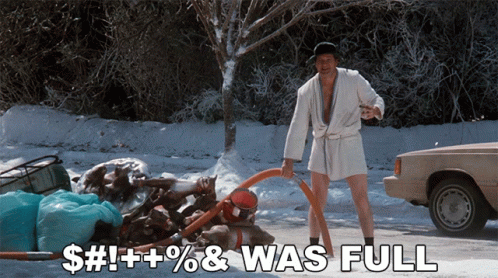A Man In A Bathrobe Is Pumping Water From A Hose With The Words $ # ! + ! % & Was Full Written Below GIF
