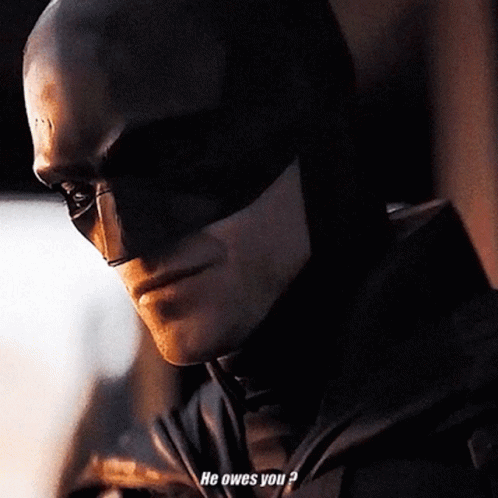 A Man In A Batman Costume Says He Owes You ? GIF