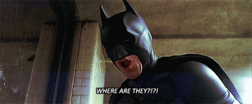 A Man In A Batman Costume Says " Where Are They " GIF