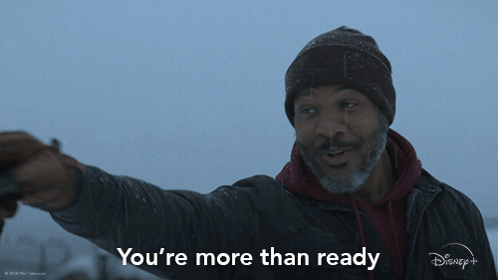 A Man In A Beanie Says " You 'Re More Than Ready " In Front Of A Disney + Logo GIF