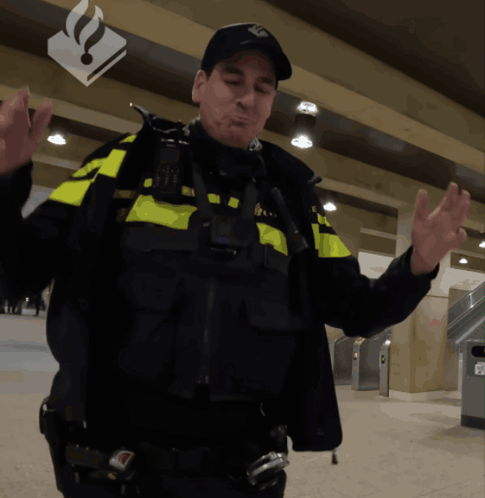 A Man In A Black And Yellow Uniform With The Letter N On His Hat GIF