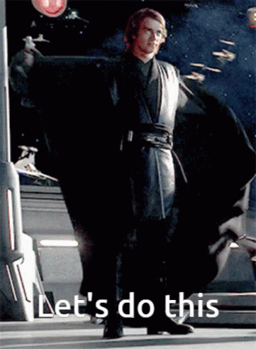 A Man In A Black Cape Is Standing In Front Of A Sign That Says " Let 'S Do This " GIF